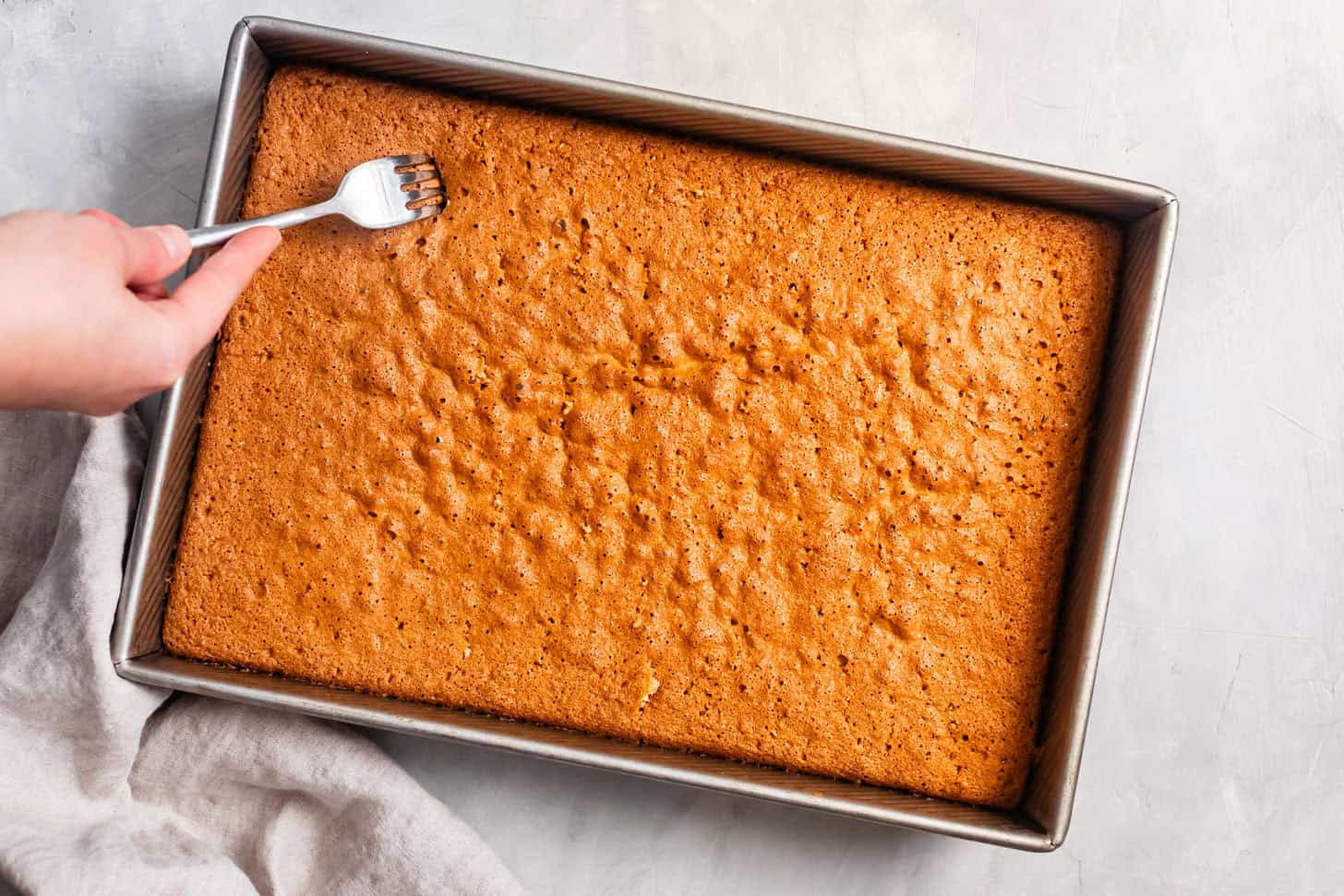 Baked Gluten-Free Tres Leches Cake with Fork Pricks