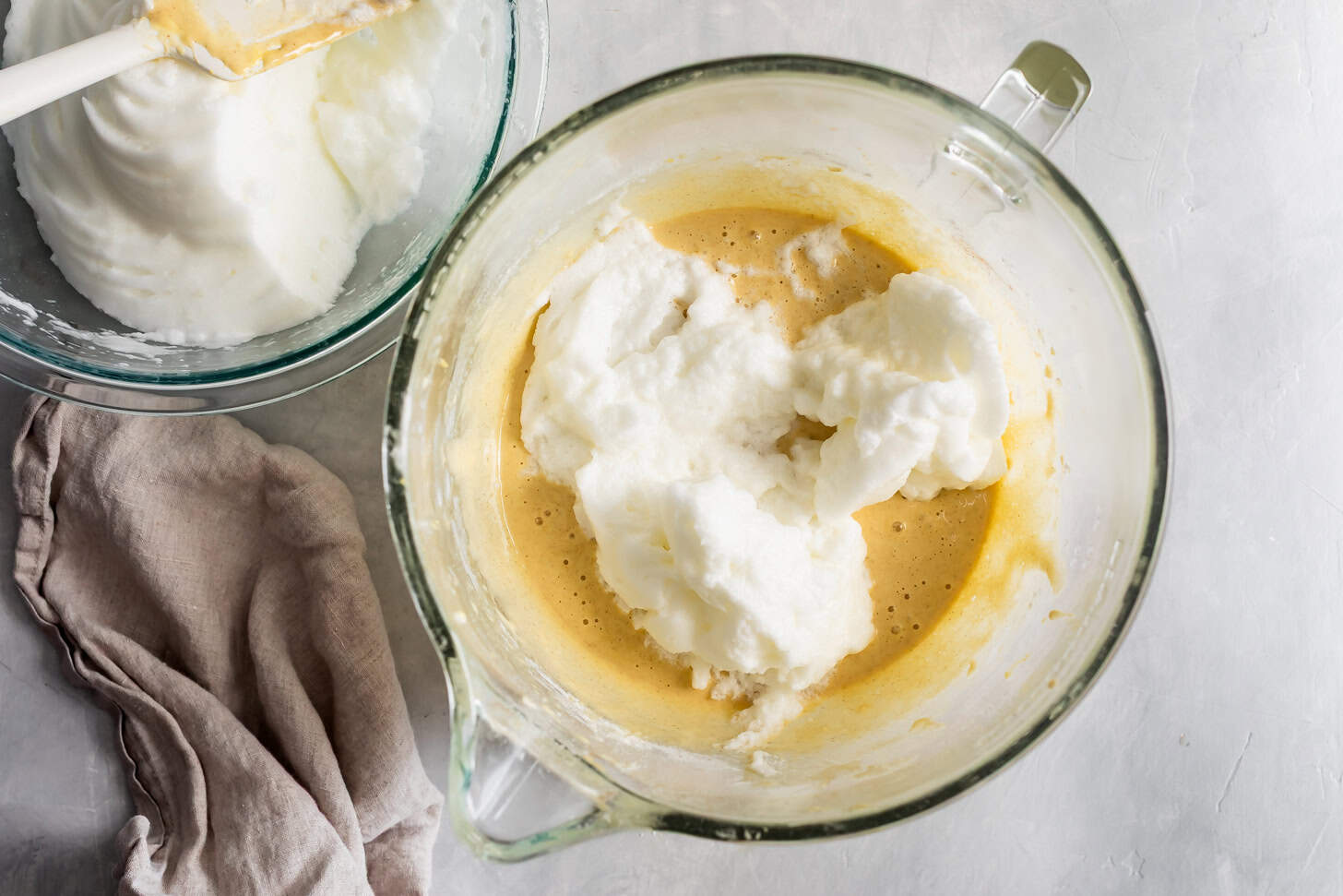Folding in whipped egg whites for tres leches cake