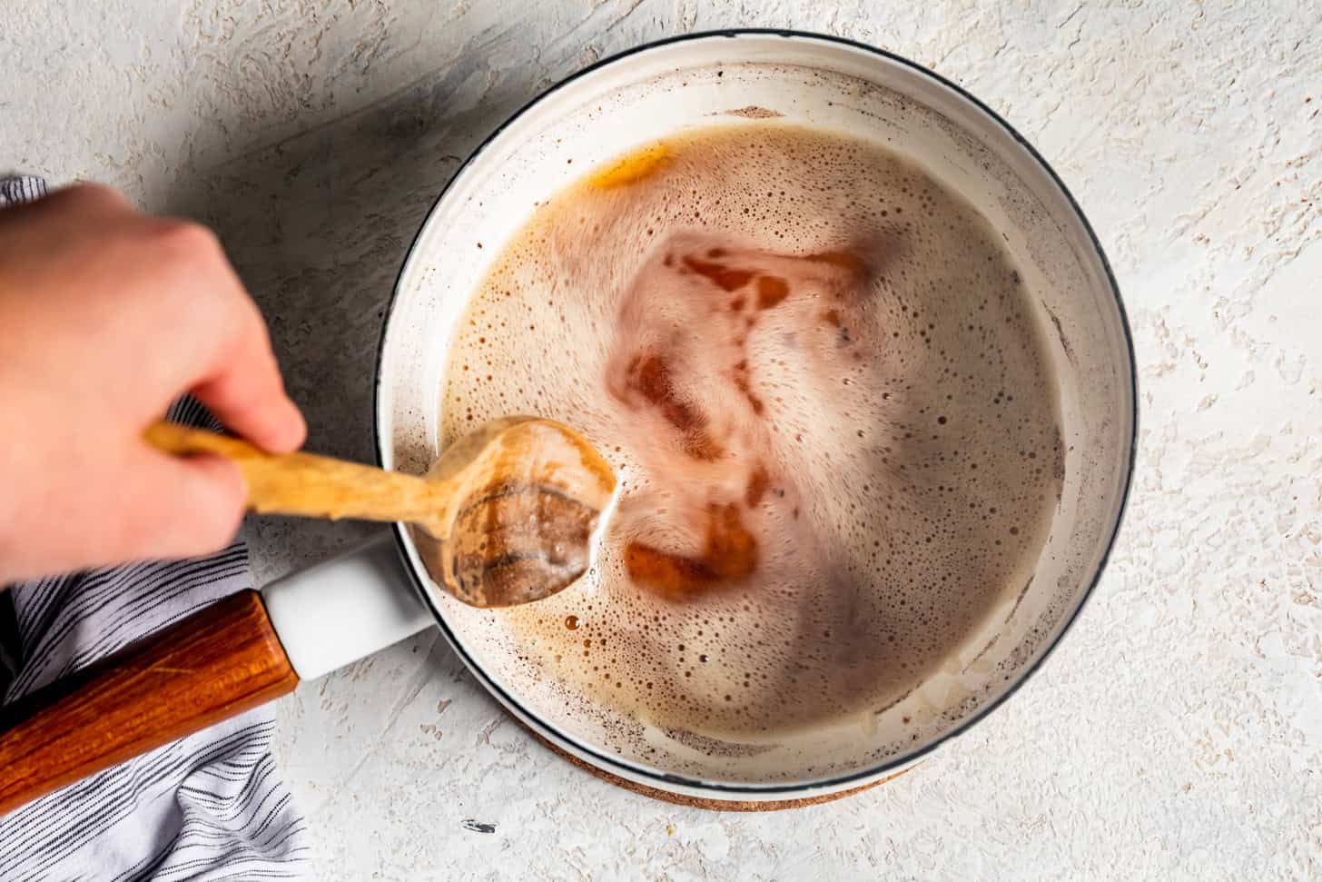 Browned butter in a white pot