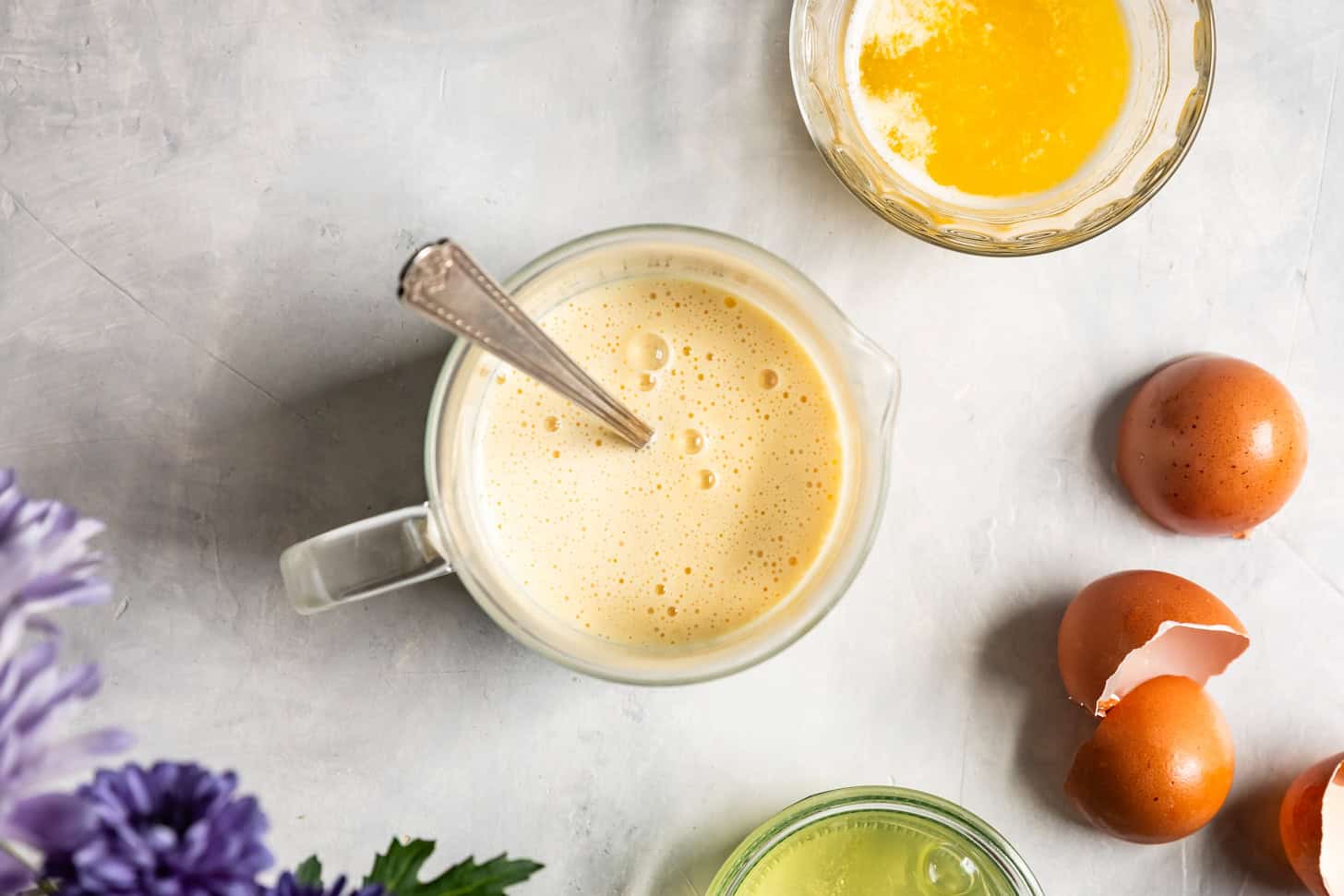 Whisking buttermilk and egg yolks for mochi pancakes