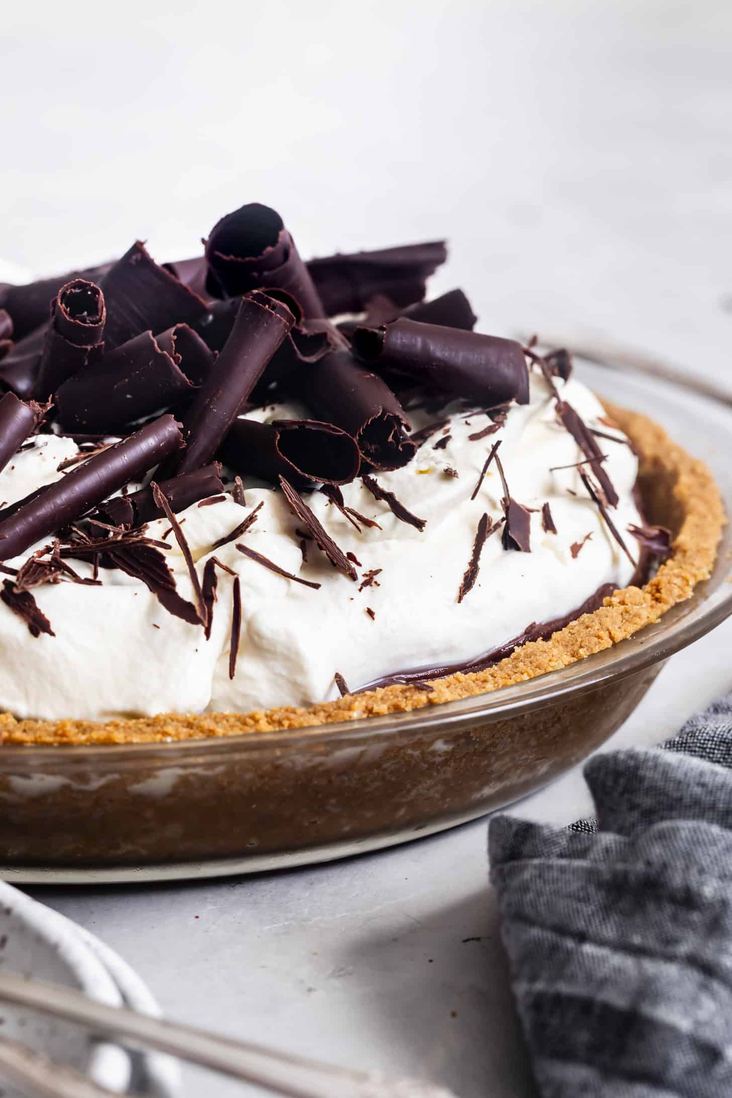 Side of Gluten-Free Chocolate Pie with Whipped Cream and Chocolate Curls