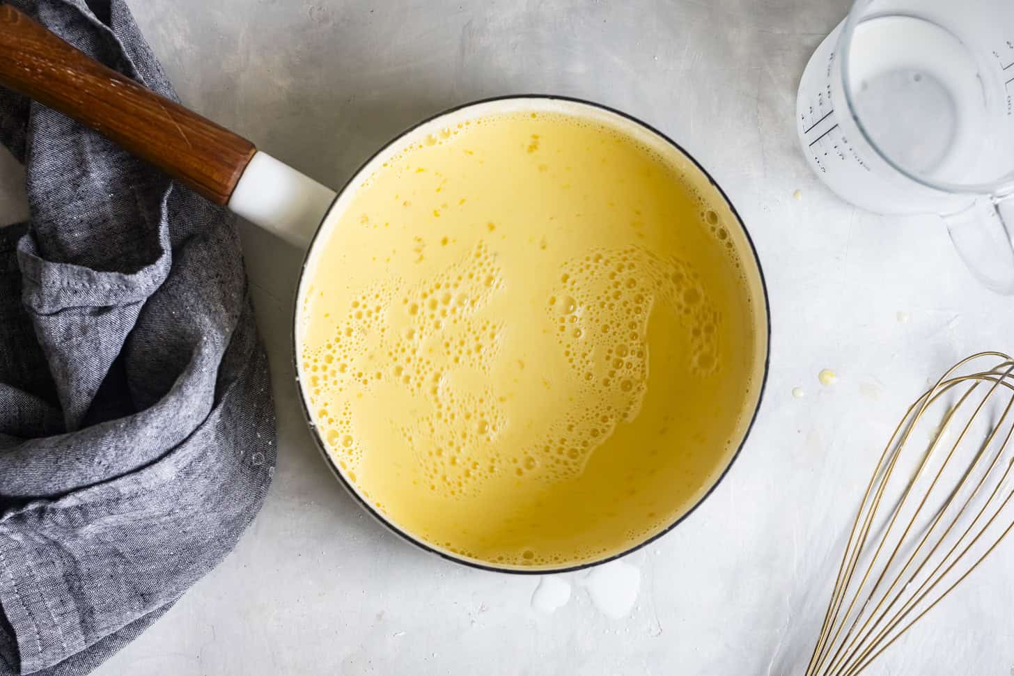 Whisking Ingredients for pudding