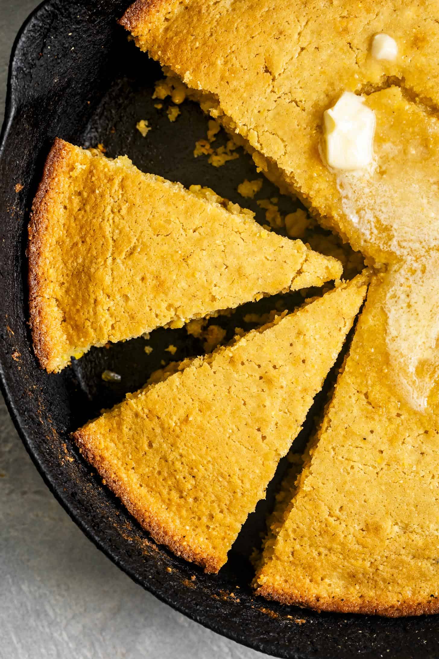 Close-up of Sliced Gluten-Free Cornbread in Skillet