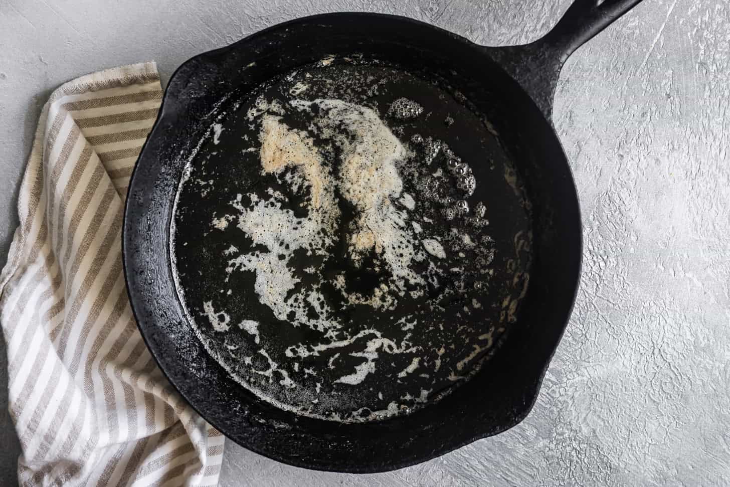 Skillet with Melted Butter for Cornbread