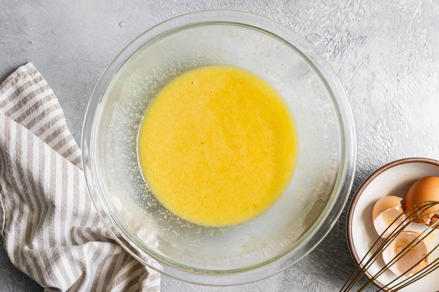 Whisked eggs, butter, and sugar for cornbread