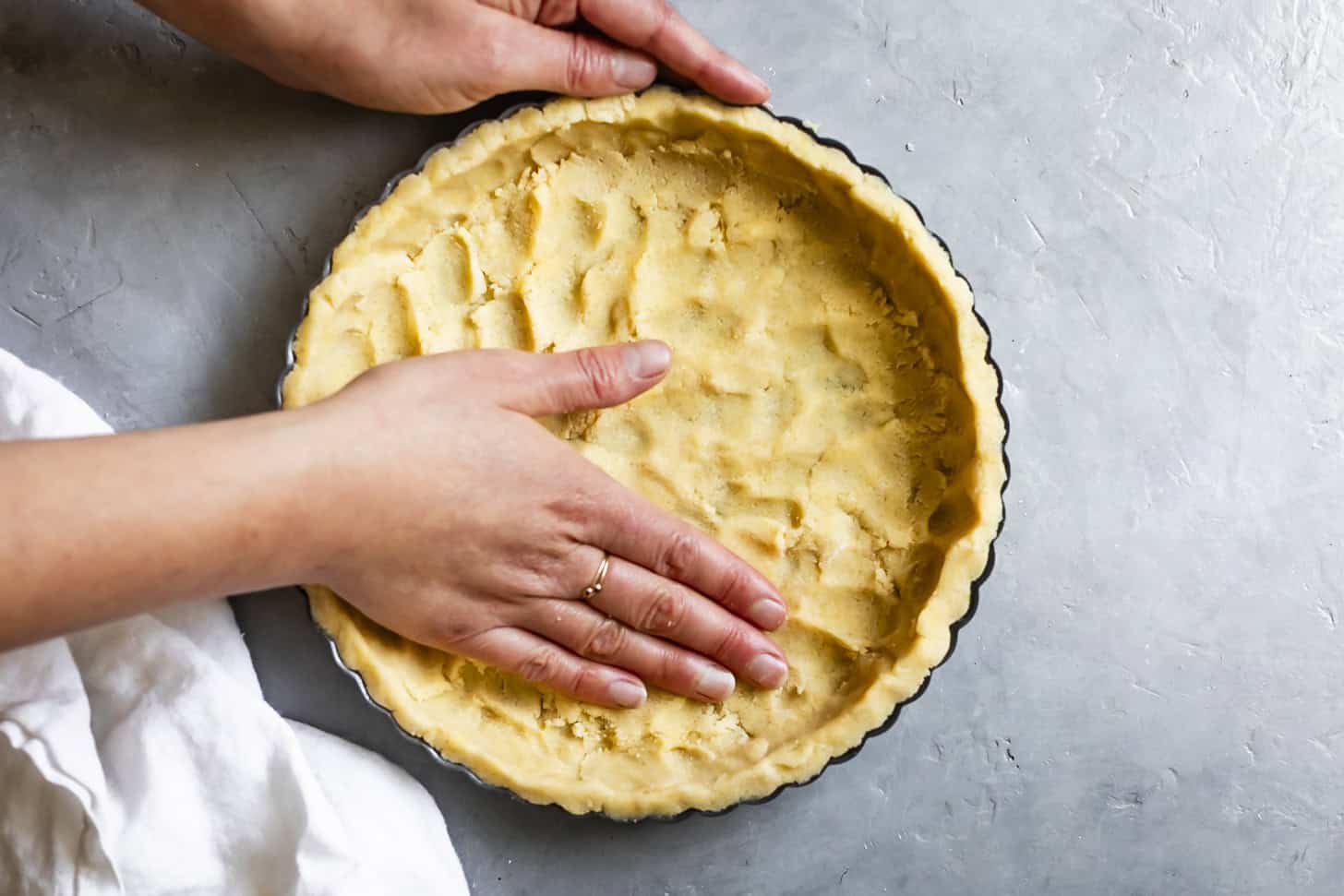 Pressing Gluten-Free Tart Dough into Pan