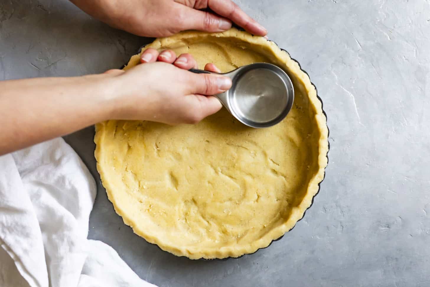 Pressing Gluten-Free Tart Dough into Pan