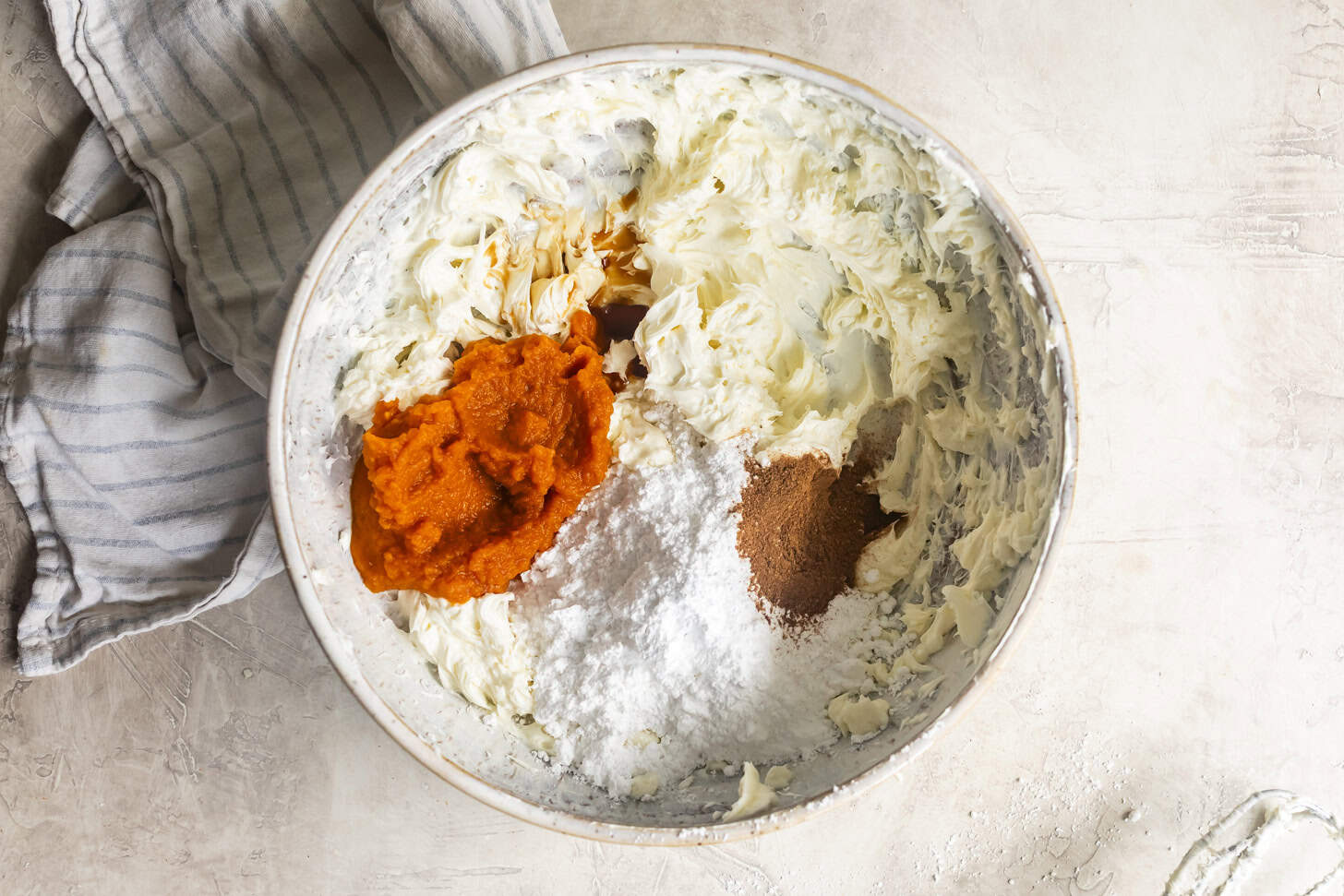 Adding Pumpkin, Sugar, and Spices to Pumpkin Cheesecake Balls