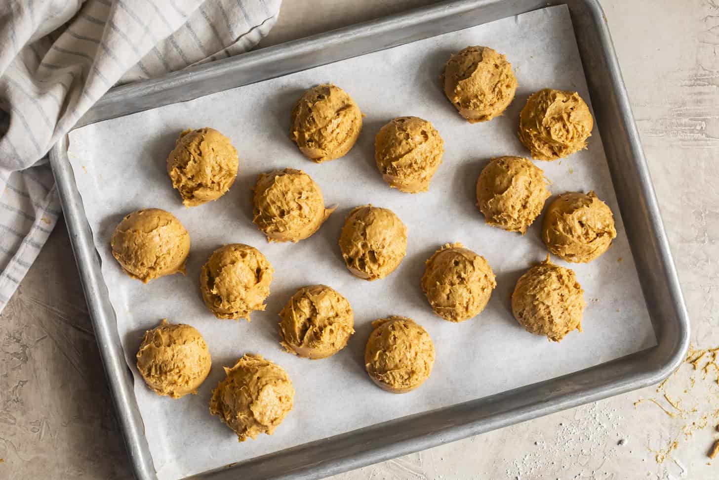 Scooping No-Bake Pumpkin Cheesecake Truffles