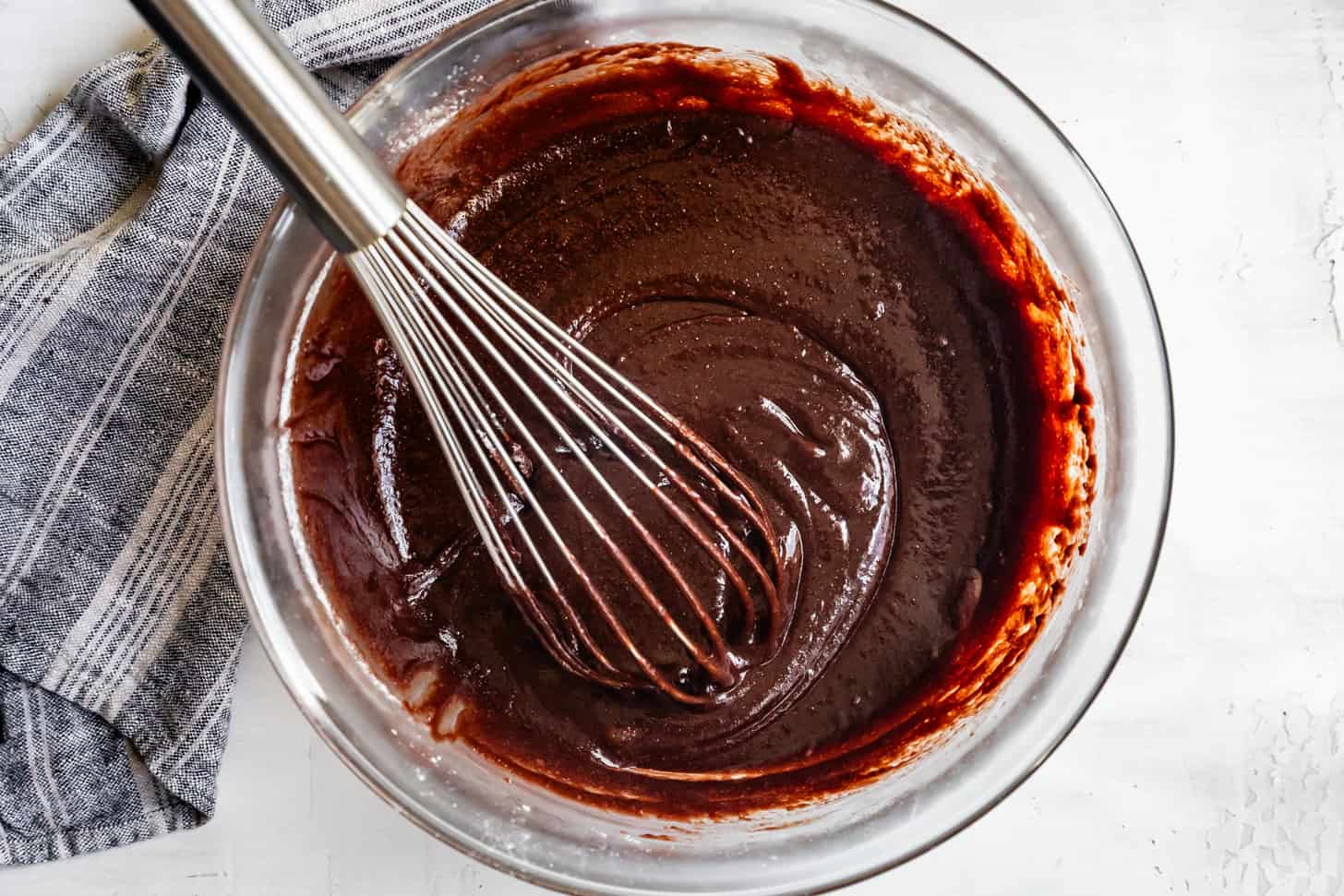 Whisked Gluten Free Texas Sheet Cake Batter in Glass Bowl