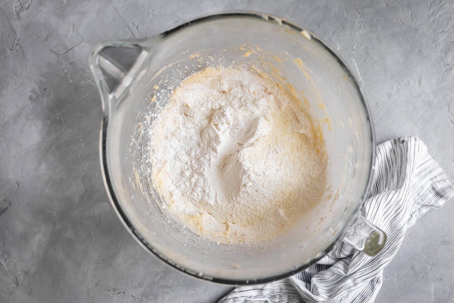 Adding dry ingredients for making gluten-free butter cookies